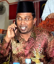 Datuk Seri Dr Zambry Abd Kadir being congratulated by family members and friends on the phone after the Court of Appeal ruled in his favour. Picture source: The Star