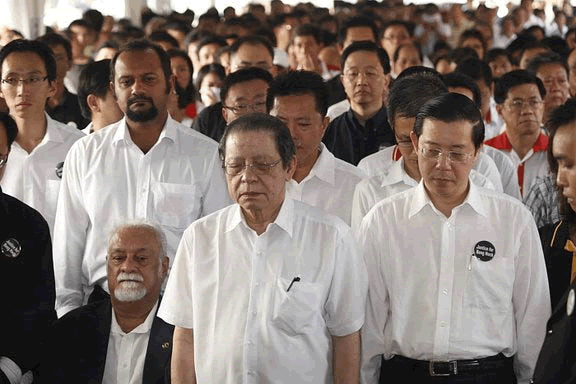 At Teoh's funeral. Pix from Screenshots.